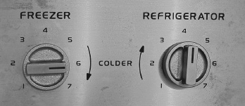 FIGURE 1.9. Refrigerator Controls. Two compartments— fresh food and freezer—and two controls (in the fresh food unit). Your task: Suppose the freezer is too cold, the fresh food section just right. How would you adjust the controls so as to make the freezer warmer and keep the fresh food the same? (Photograph by the author.)