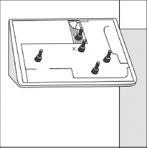 FIGURE 4.5. A Natural Mapping of Light Switches to Lights. This is how I mapped five switches to the lights in my living room. I placed small toggle switches that fit onto a plan of the home’s living room, balcony, and hall, with each switch placed where the light was located. The X by the center switch indicates where this panel was located. The surface was tilted to make it easier to relate it to the horizontal arrangement of the lights, and the slope provided a natural anti-affordance, preventing people from putting coffee cups and drink containers on the controls.
