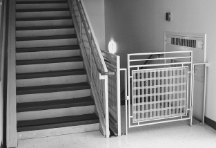 FIGURE 4.7. A Lockout Forcing Function for Fire Exit. The gate, placed at the ground floor of stairways, prevents people who might be rushing down the stairs to escape a fire from continuing into the basement areas, where they might get trapped.